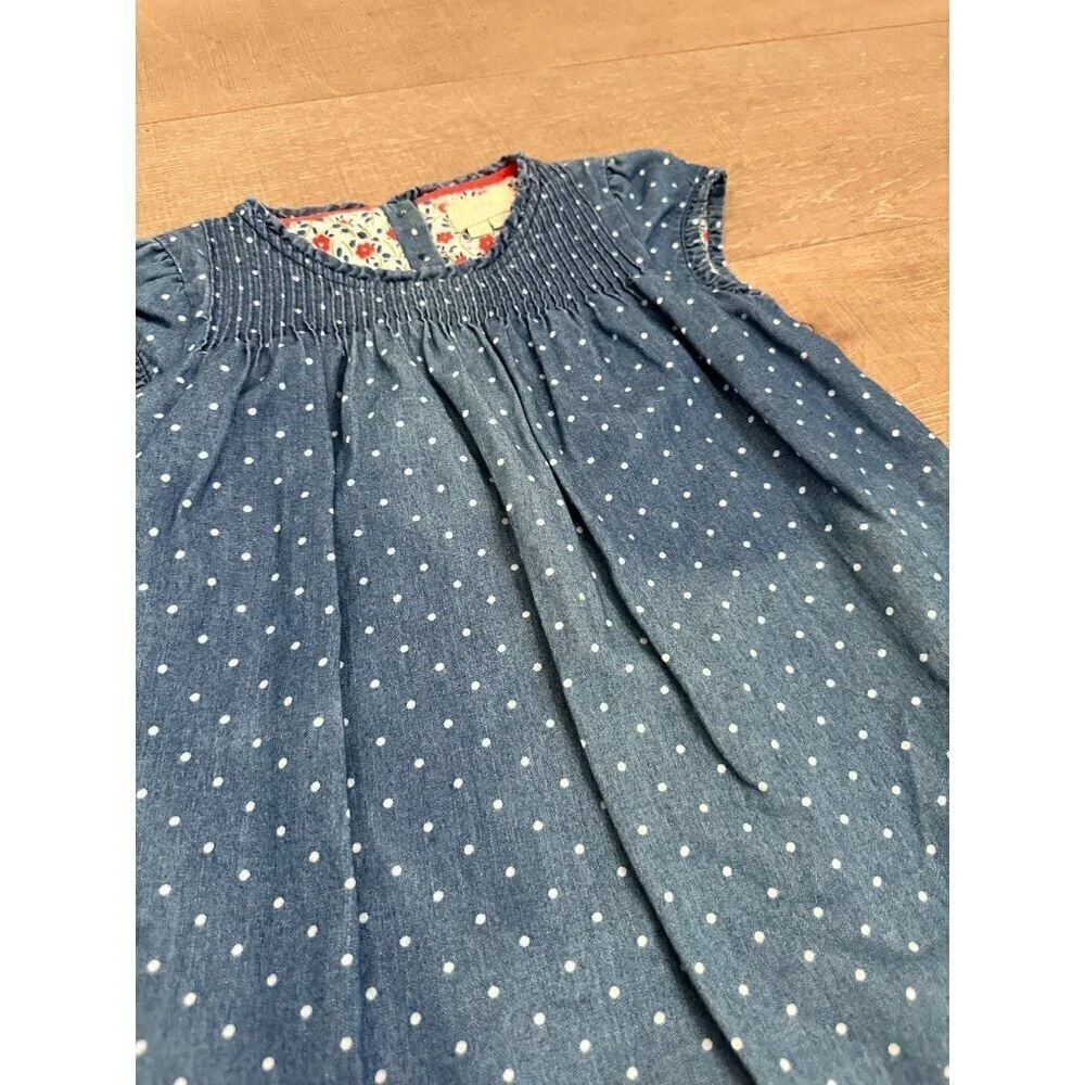 Girls Blue Polka Dot Denim Dress With Floral Lining Cap Sleeves & Button Back Cl